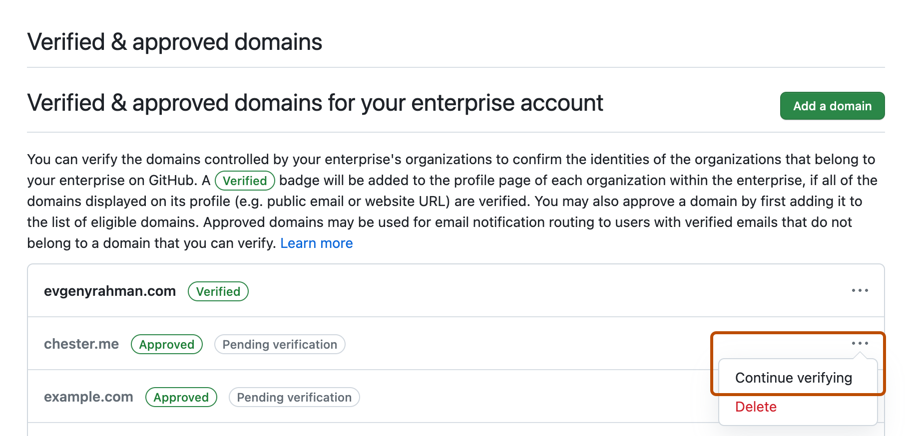 Screenshot of the list of verified and approved domains for your enterprise. A dropdown menu labeled with three dots is expanded and highlighted with an orange outline, along with the "Continue verifying domain" option.