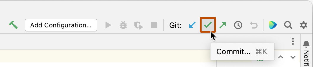 Captura de pantalla de la barra de navegación en la parte superior del cliente de JetBrains. El icono de marca de verificación para confirmar los cambios está resaltado.