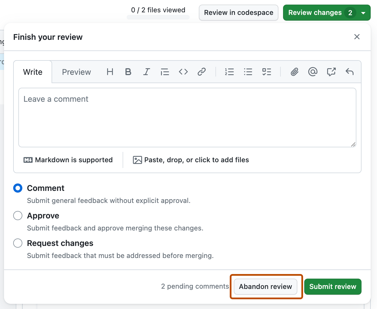 Screenshot of the comment field for a review. The "Abandon review" button is outlined in dark orange.